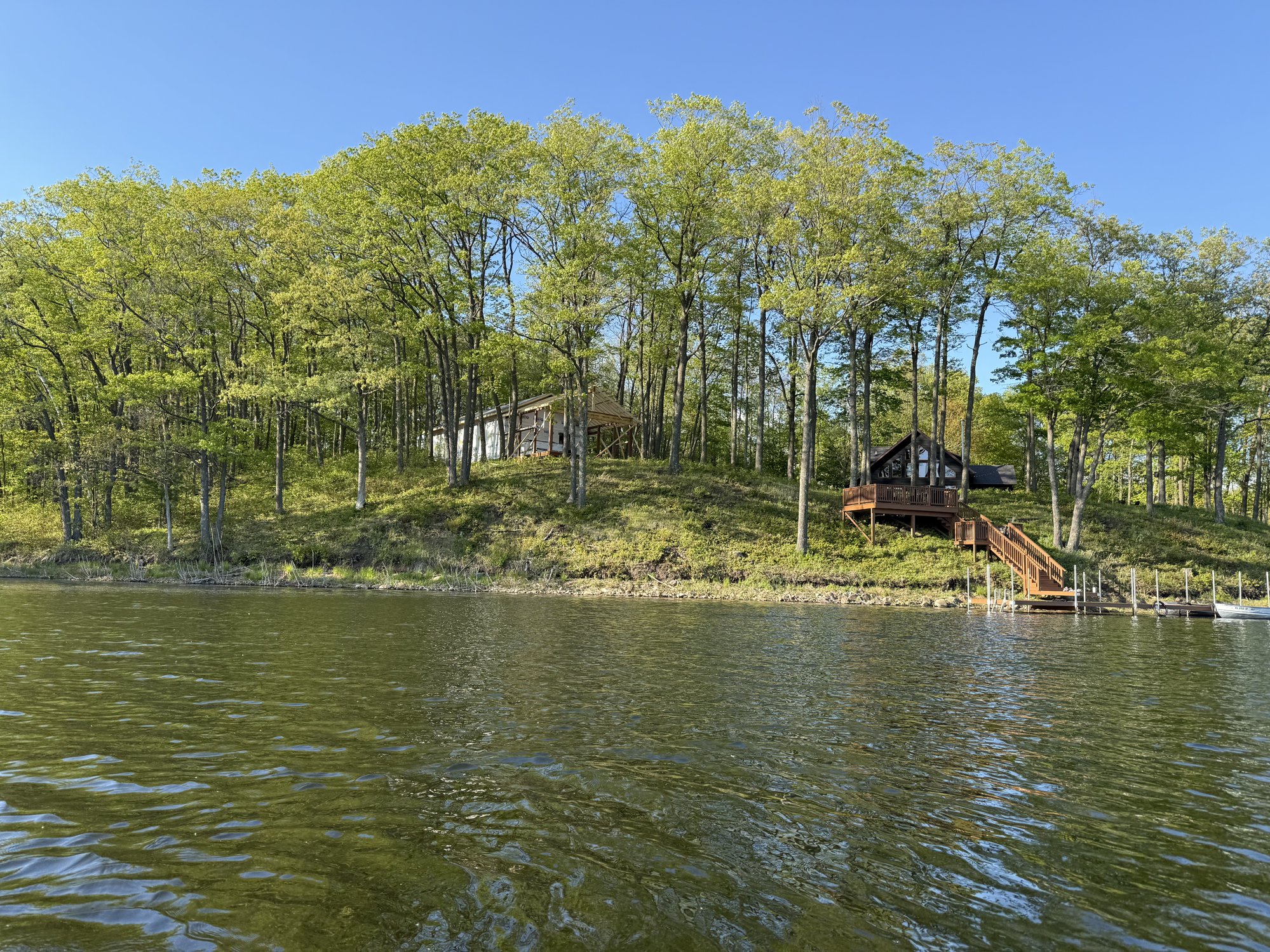 The Coach House on the point at Nick Lake